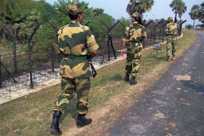 Border Security Force Personnel Patrol Along The India-Bangladesh ...