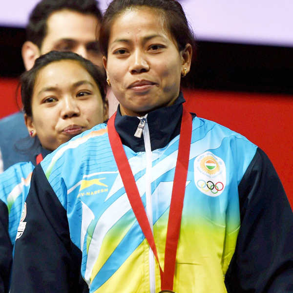 CWG '14: Sanjita wins gold in weightlifting