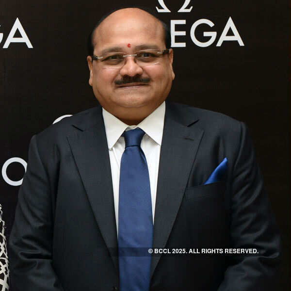 Abhishek unveils Omega watches