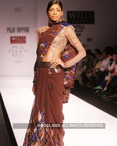 Bhawna presents a creation by designer Puja Nayyar during Day 5 of ...