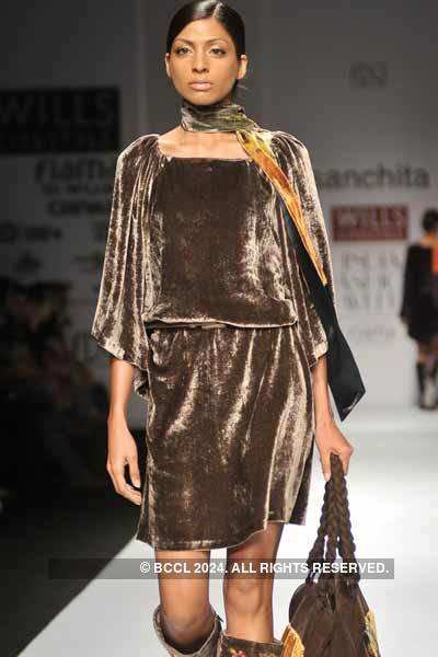 A model presents a creation by designer Sanchita during Day 5 of Wills ...