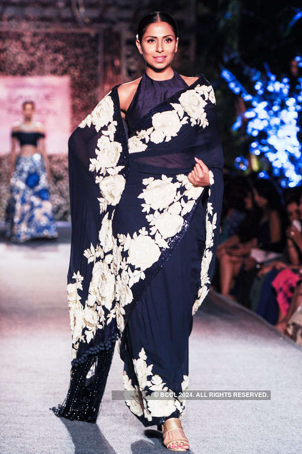 Model Candice Pinto showcases a creation by designer Manish Malhotra on ...