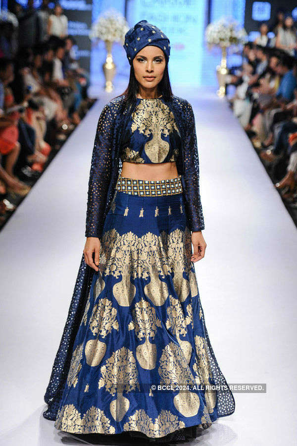 A model showcases a creation by designers Sonam and Paras Modi on Day 4 ...