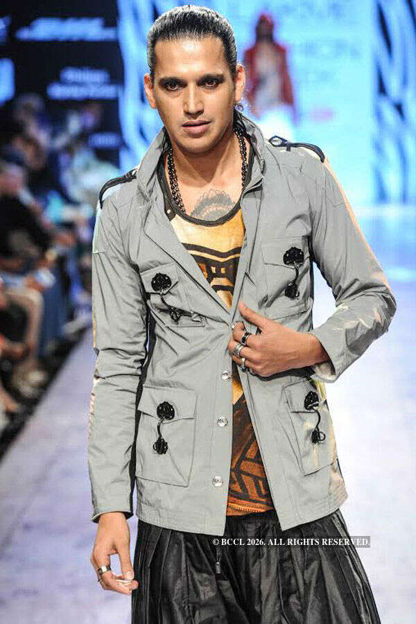Designer Kunal Rawal poses with Arjun Kapoor and Shahid Kapoor during ...
