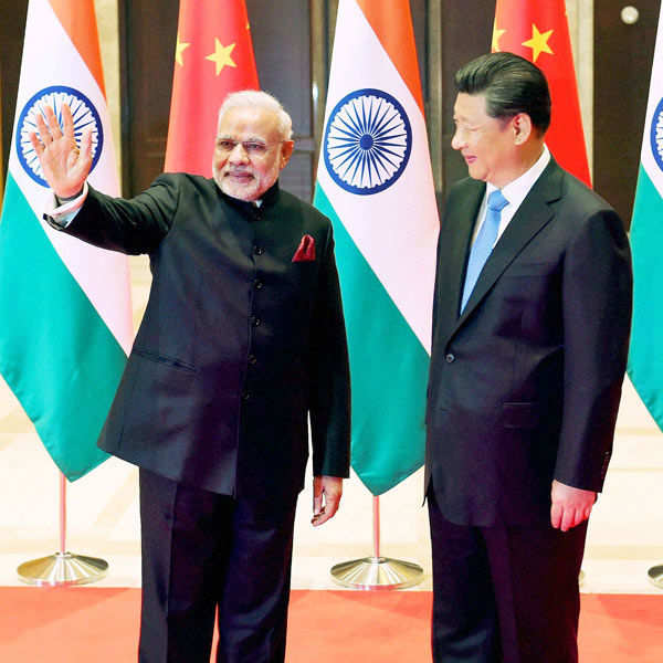 PM meets China's Xi on home ground