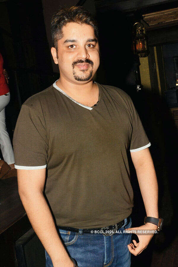 Saurabh Mehta poses during a get together Photogallery - Times of India