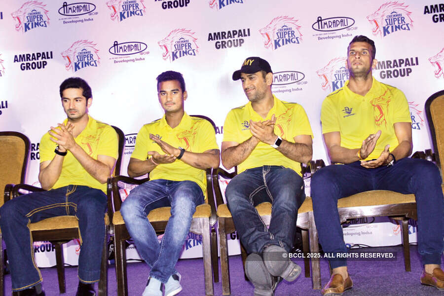 Mohit Sharma (L) and Pawan Negi with other team-mates during an event Photogallery - Times of India