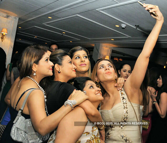 Girls take selfie during a party