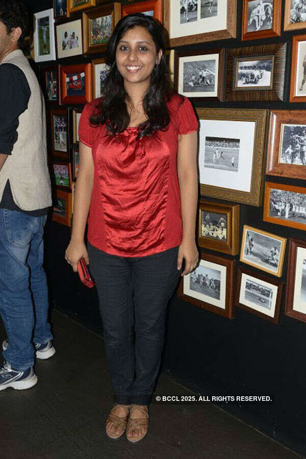 Nikitha poses during a band night Photogallery - Times of India