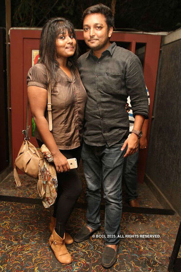 Rachel and Vijay during a party