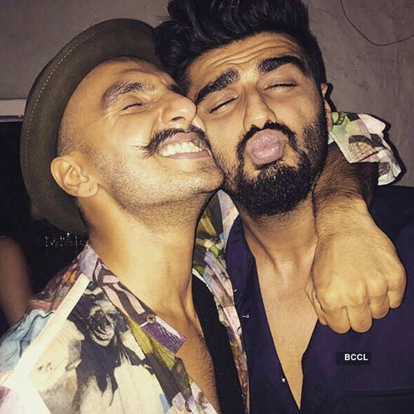 Ranveer Singh and Arjun Kapoor pose for a selfie during the success party of Piku.  Photogallery at Times of India
