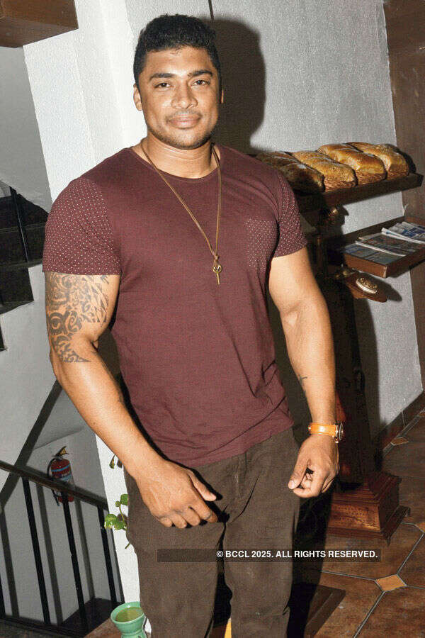 Mohan Kumar poses during a celebratory dinner Photogallery - Times of India