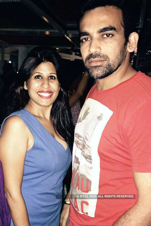 Zaheer Khan with a guest during an after party Photogallery - Times of India