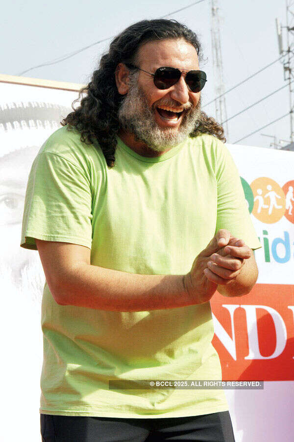 A participants attends the laughter and dance meditation session Photogallery - Times of India