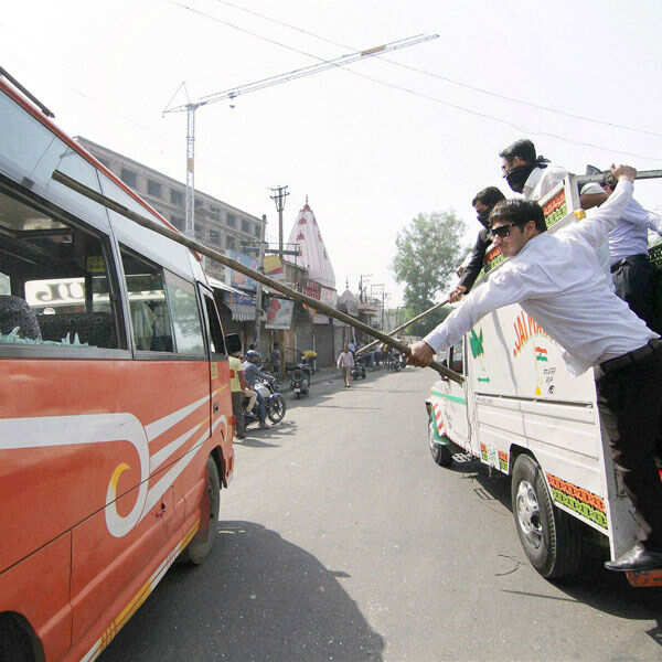 Members of Bar Association attacks a passenger bus Photogallery - Times of India