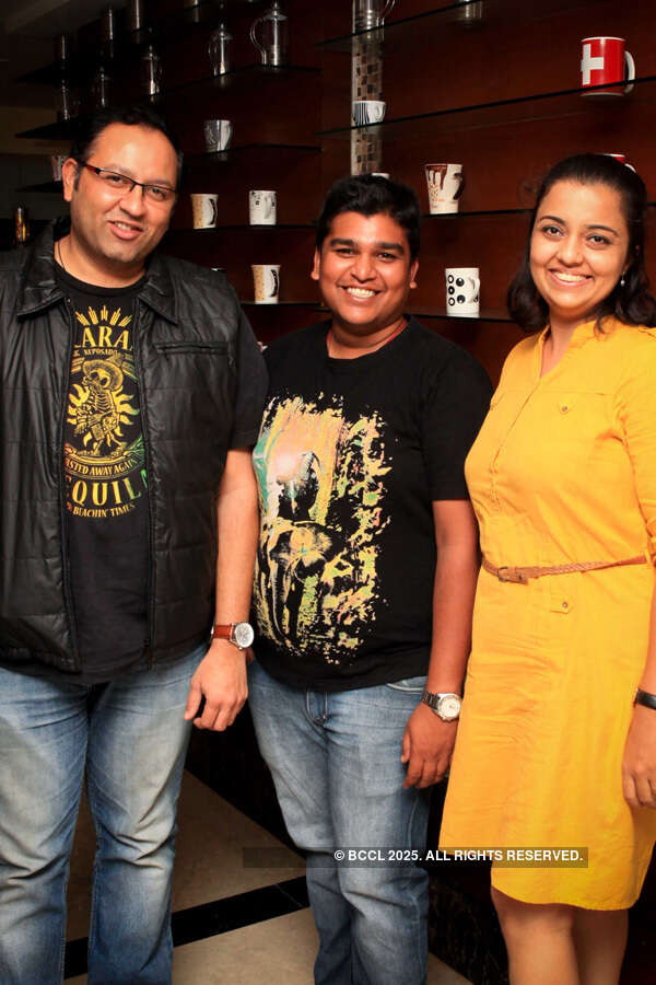 Nameesh, Naveen and Swapnil during a Parsi food fest