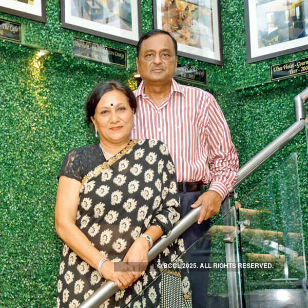 Rashmi and Pradeep Vaid pose for a photo