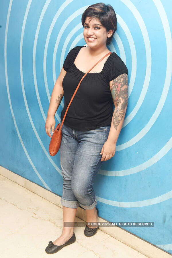 Mridhula smiles for a photo during a party