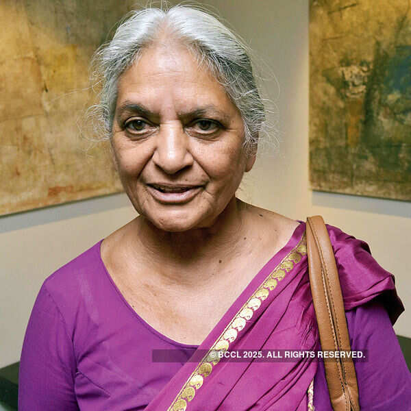 Nirmala Sharma attends a painting exhibition