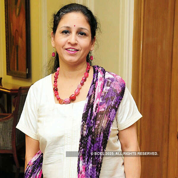 Jyotsna poses for a photo on her arrival for a Monsoon theme party