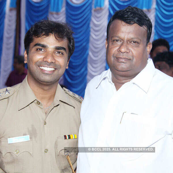 SV Babu poses with a guest during the launch of film Pataki