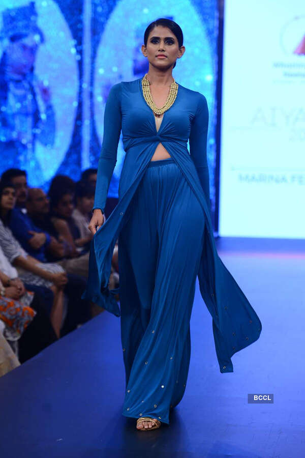 A model walks the ramp during Aiyanna 2015