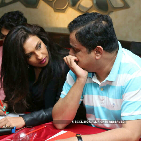 Rituparna Sengupta interacts with Bratya Basu during the trailer launch