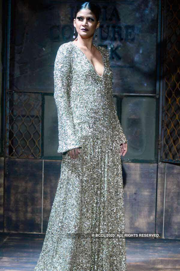 Model Carol Gracias walks the ramp for Sabyasachi