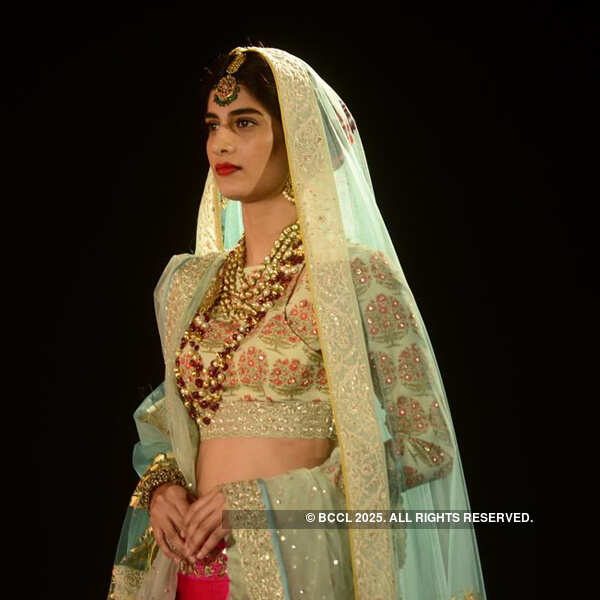 A model walks the ramp for Anju Modi's show