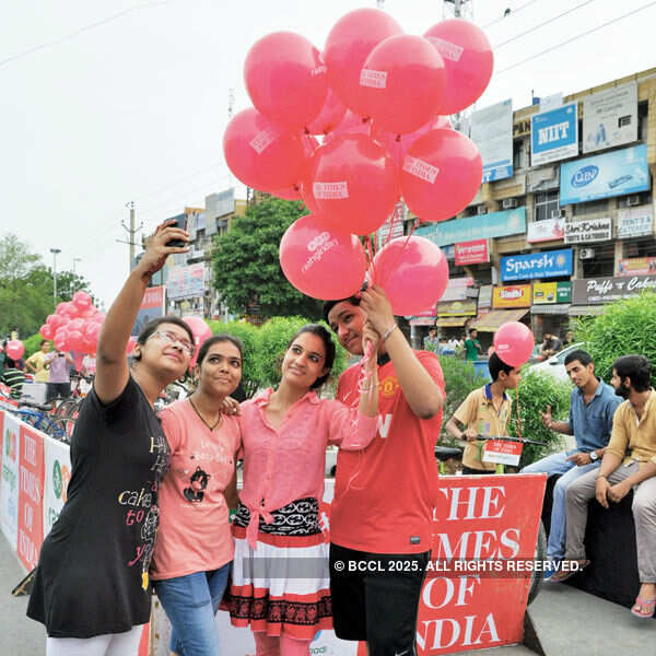 Participants take a selfie during the Raahgiri Day