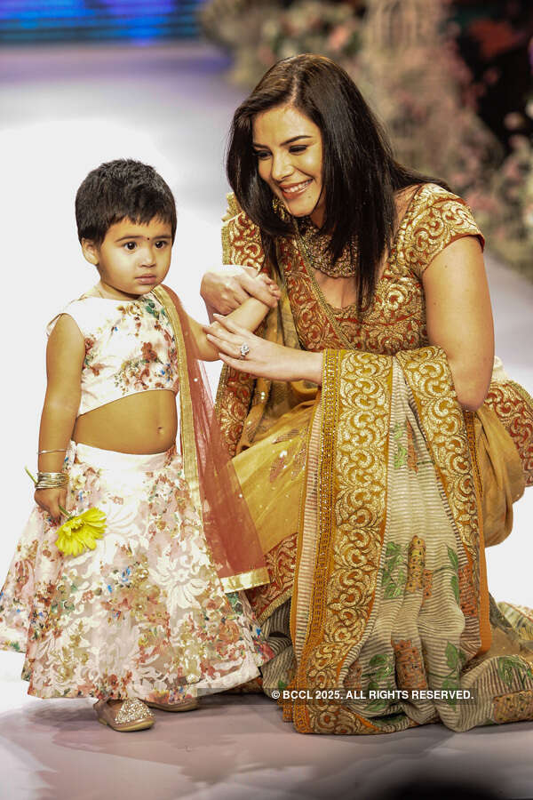 Urvashi Sharma with daughter Samaira showcases a creation by Shaina NC for Beti
