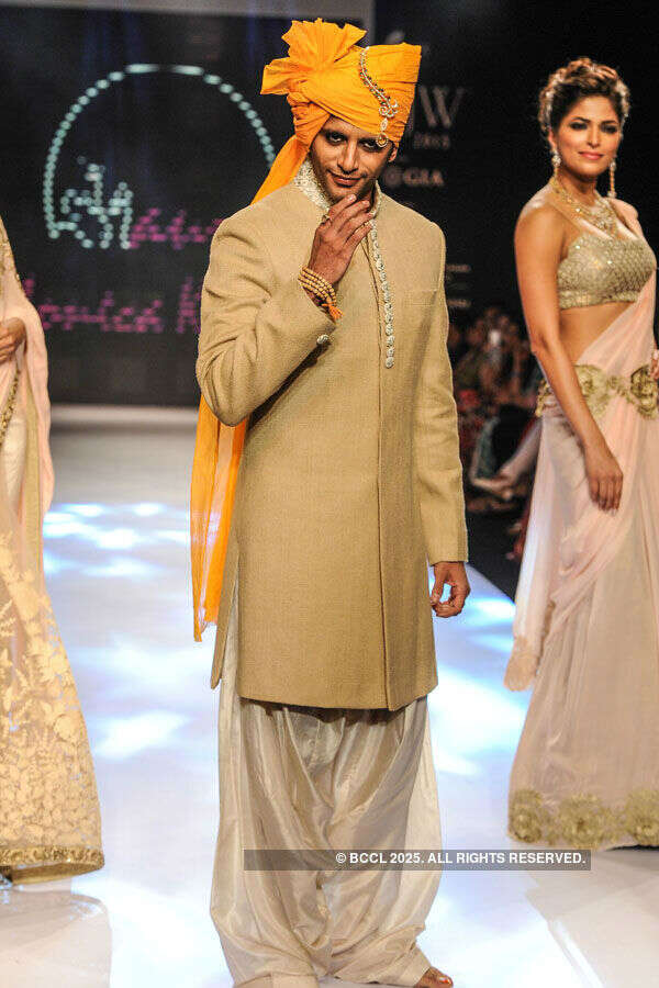 Karanvir Bohra walks the ramp