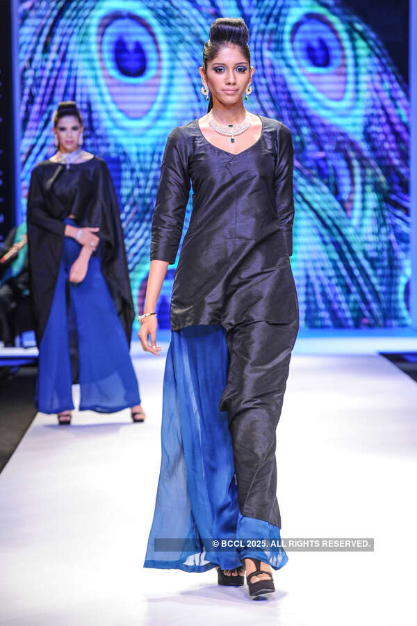 A model showcases a creation by IIGJ Mumbai