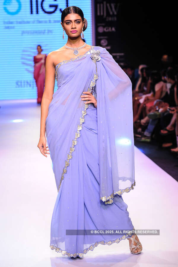 A model showcases a creation by IIGJ Jaipur