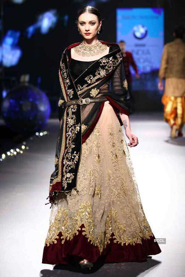 A model walks the ramp for designer Tarun Tahiliani