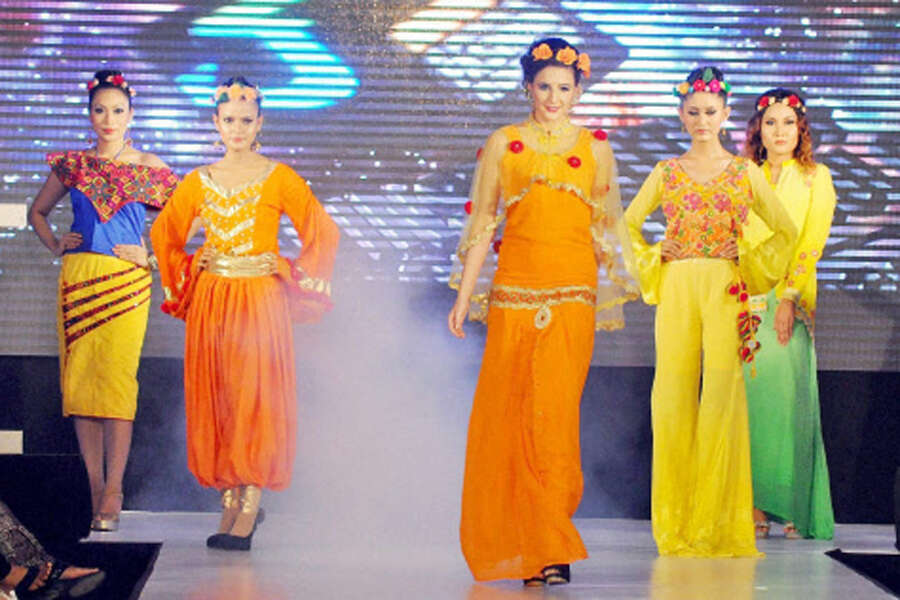 Models walk the ramp at a fashion show i