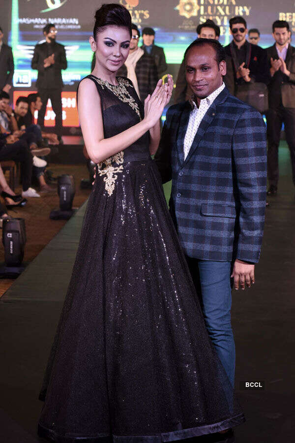 A designer takes a bow on Day 1