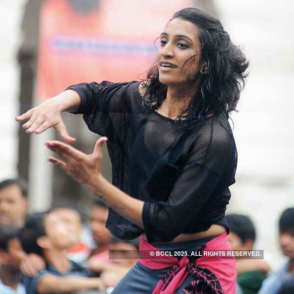A participant performs during the Raahgiri Day