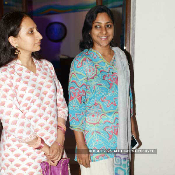 Rekha with a guest during the launch of Ramli Ibrahim's second book