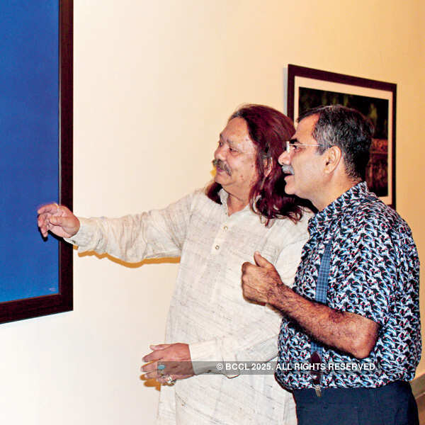 Mohammad Shakeel (L) and Ravi Kapoor during a photography exhibition