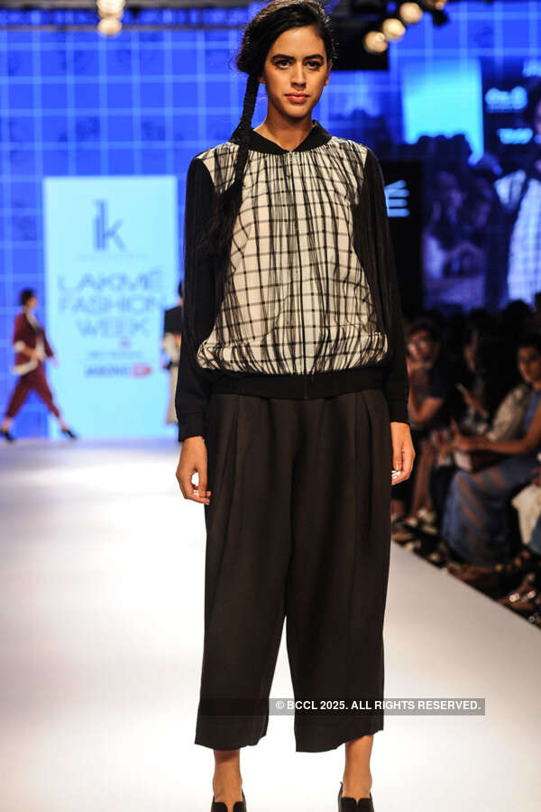 A model showcases a creation