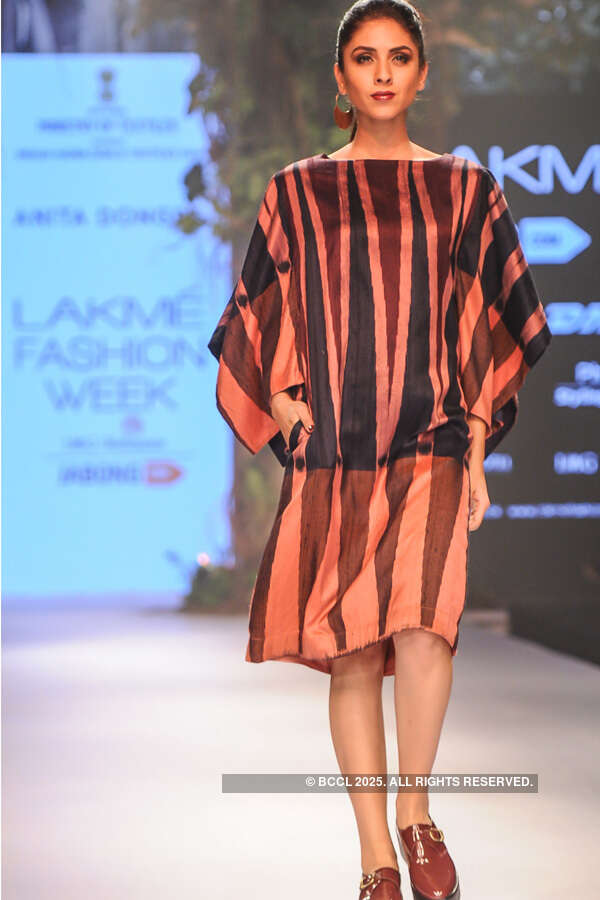 A model showcases a creation