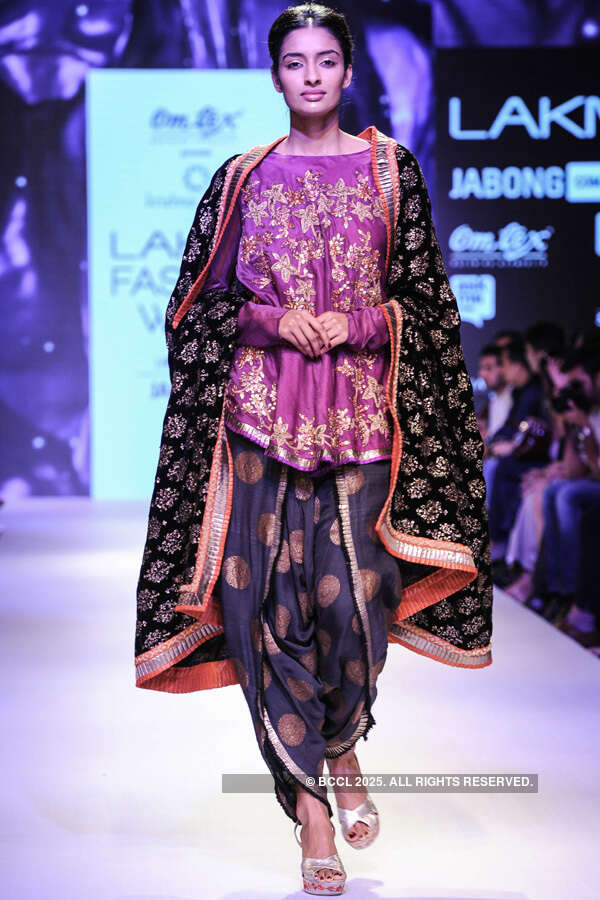 A model showcases a creation