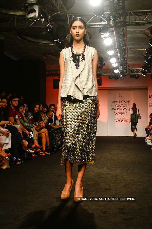 A model showcases a creation