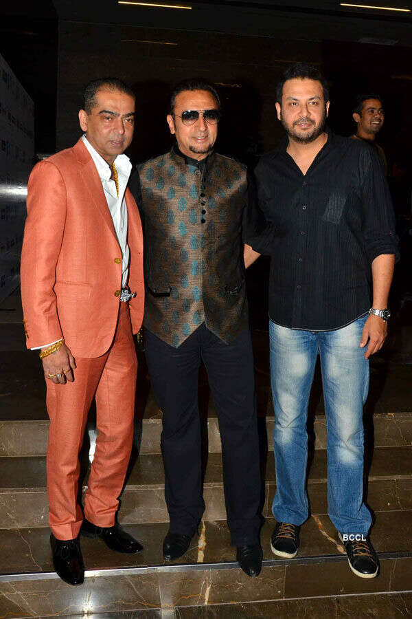 Gulshan Grover poses with guests during the special screening
