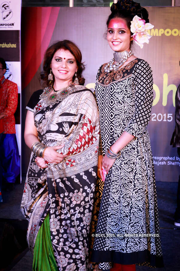 Shalini Sudarshan with a model during a fashion show