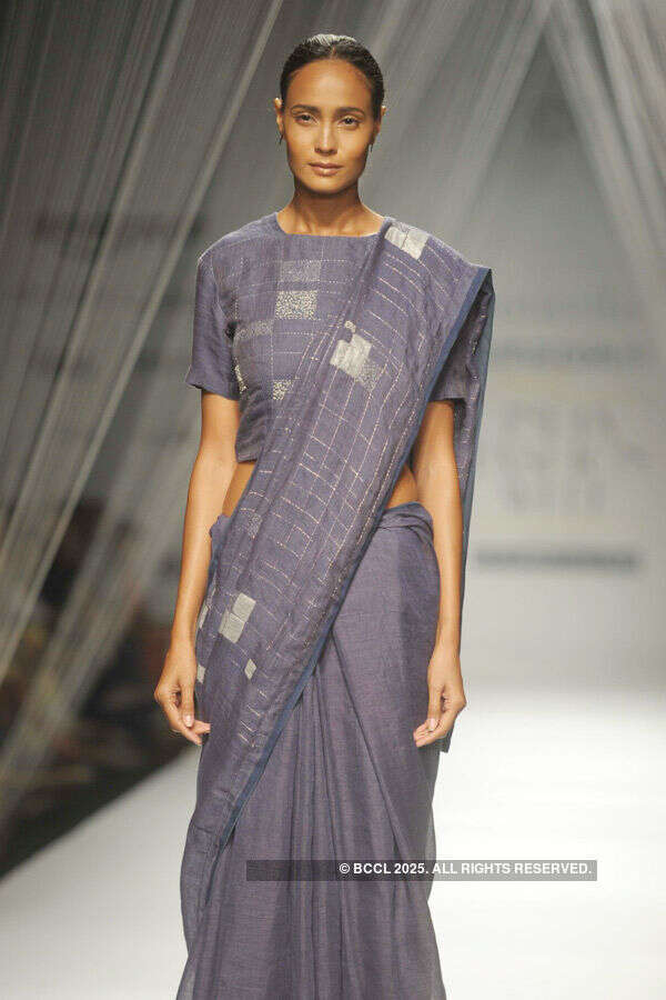 ​A model showcases a creation