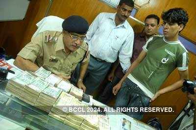 Youth held with fake notes