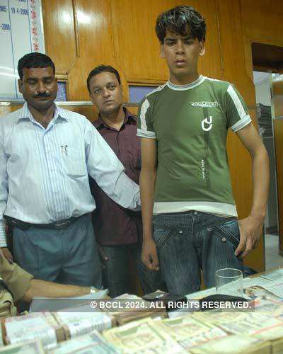 Youth held with fake notes