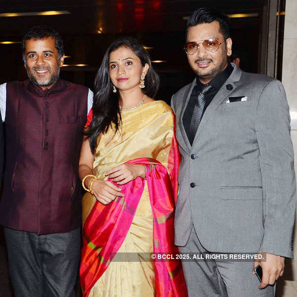 Chetan Bhagat With His Wife And A Guest During The Wedding Reception Of Designer Masaba Gupta And Film Producer Madhu Mantena Varma Held In Mumbai Photogallery She can answer it better but. chetan bhagat with his wife and a guest